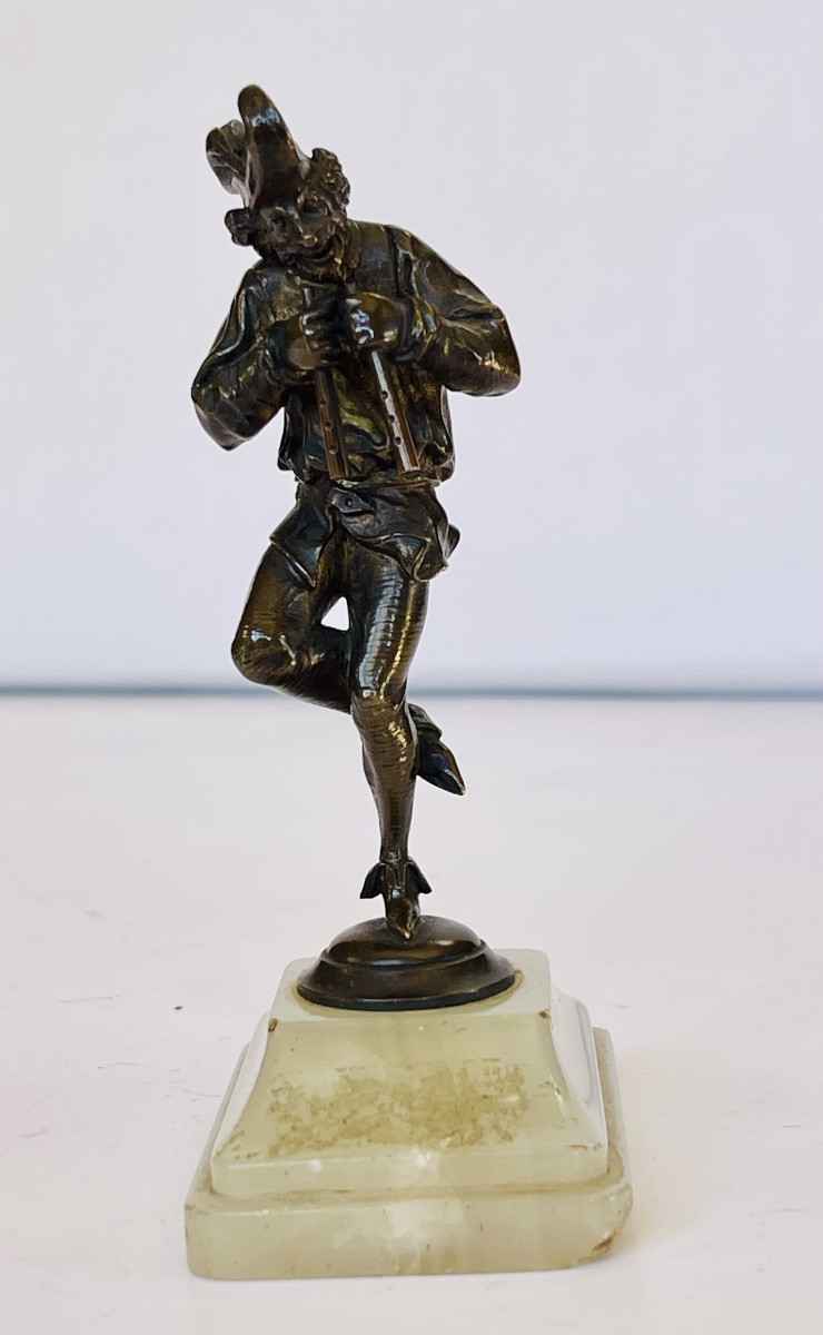 Ménestrel flûtiste en bronze 